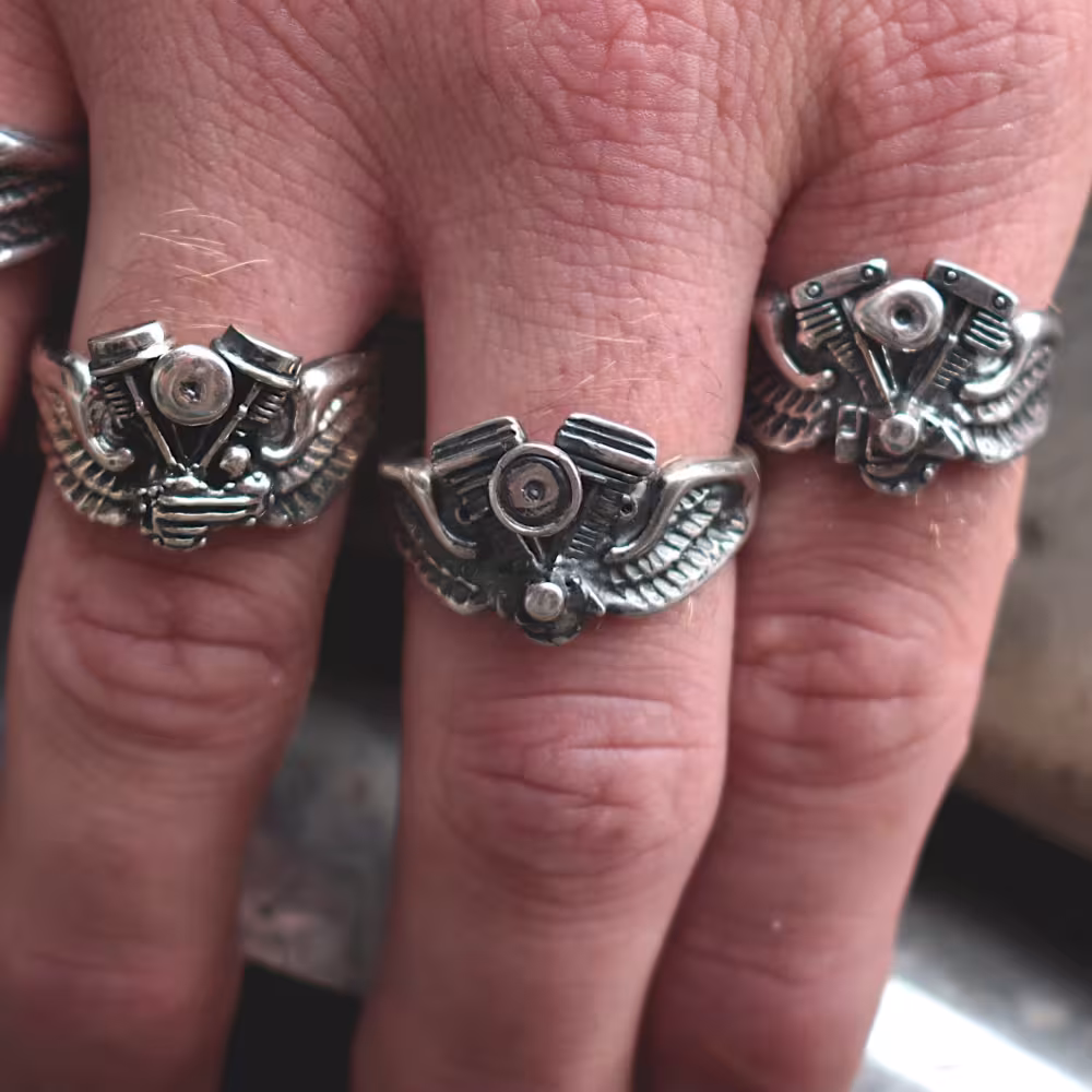 Evolution Ring on Wings - Sterling Silver